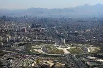 عکس| سفر در زمان؛ منظره تهران از فراز بام خانه ای در حوالی عباس آباد؛ سال 1345