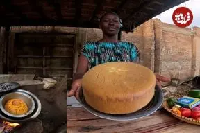 ببینید| غذای روستایی در کنیا؛ پخت کیک کدو تنبل در هوای بارانی