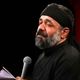 عکس؛ سفر به تاریخ؛ «محمود کریمی» در نوجوانی در حال خواندن قرآن در جبهه؛ دهۀ 60