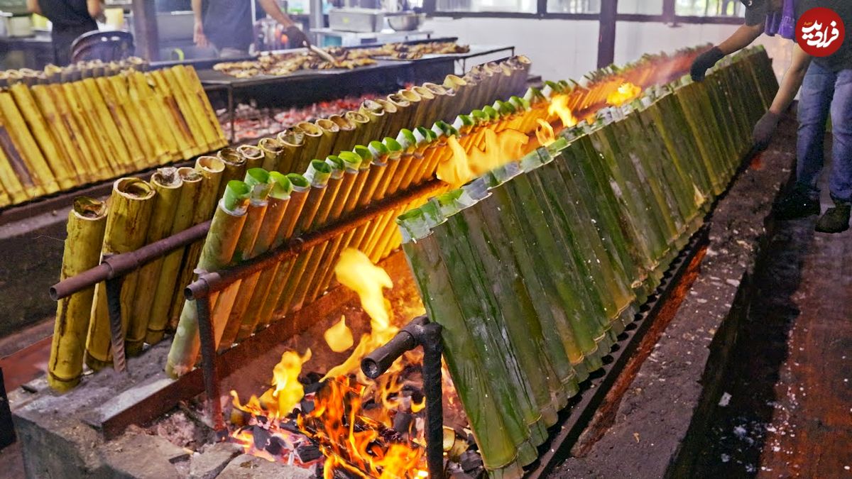 ببینید| غذای خیابانی در مالزی؛ تهیه غذا با برنج، ران مرغ و شیر نارگیل در کوالامپور