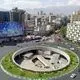 عکس| سفر به ایران قدیم؛ یک خیابان خاکی شلوغ در تهران در دوران قاجار