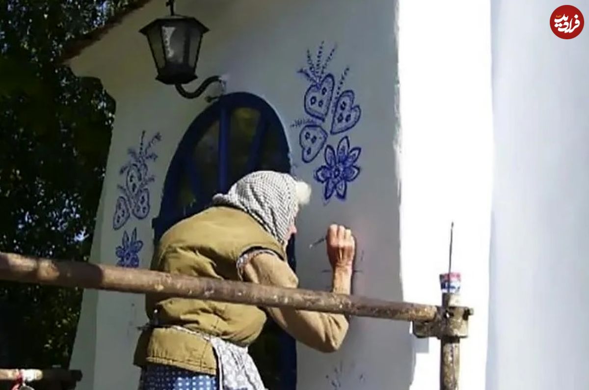 عکس؛ هنر خیابانی؛ آثار چشم‌نواز «پیرزن ۹۰ ساله» بر روی دیوارهای روستا