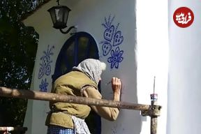عکس؛ هنر خیابانی؛ آثار چشم‌نواز «پیرزن ۹۰ ساله» بر روی دیوارهای روستا