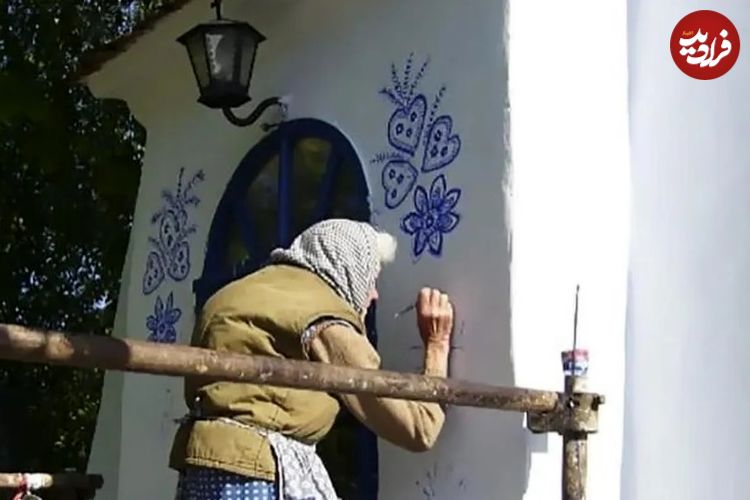 عکس؛ هنر خیابانی؛ آثار چشم‌نواز «پیرزن ۹۰ ساله» بر روی دیوارهای روستا