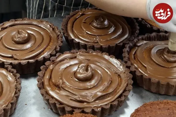 ببینید| غذای خیابانی در کره؛ تهیه محبوب ترین کیک شکلاتی در سئول