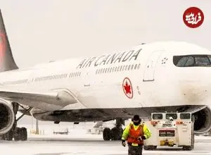 ببینید | یخ زدن یک هواپیما در فرودگاه تورنتو کانادا