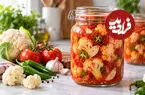 طرز تهیه ترشی گل‌کلم با آب گوجه فرنگی؛ خوش‌رنگ و ترد