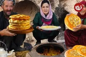 ببینید| غذای روستایی در افغانستان؛ پخت نان سنتی در تنور گِلی در روستایی زیبا
