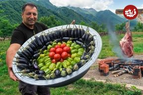 ببینید؛ غذای روستایی در آذربایجان؛ پخت دلمه فلفل و بادمجان توسط آشپز مشهور