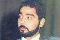 عکس| سفر به تاریخ؛ «عدی، پسر بی رحم صدام» در حال سیگار کشیدن با پسرش؛ دهه 70