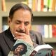 عکس| سفر به تاریخ؛ «قدرت الله ایزدی» (رشید) جلوی رستوران مک‌دونالد در آلمان؛ دهۀ 70