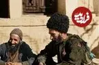 عکس| سفر زمان؛ تصویر رنگی‌شده از «مردان ژنده‌پوش» در کنار یکی از خیابان‌های تهران در دوران قاجار