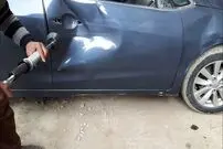 (ویدئو) مهارت دیدنی استاد کویتی در برگرداندن فرورفتگی درِ خودرو