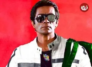 عکس| سفر در زمان؛ «چنگیز وثوقی» با اسلحه در پشت صحنه فیلم گل ها و گلوله ها؛ سال 70