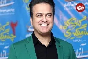 ببینید؛ لحظه احساسی بوسه حامد آهنگی بر دست مادرش در کنسرت