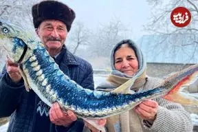ببینید| غذای روستایی در آذربایجان؛ کباب کردن ماهی خاویاری در هوای برفی