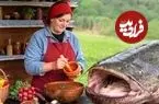ببینید| غذای روستایی در آذربایجان؛ پخت گربه ماهی غول پیکر با آلو و رب انار در تنه درخت