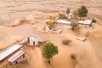 عکس‌هایی از «روستای ارواح» که شن‌های صحرا آن را بلعیده‌اند