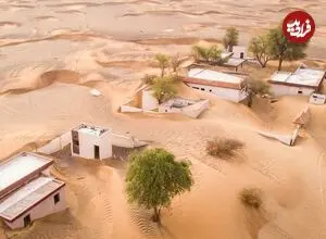 عکس‌هایی از «روستای ارواح» که شن‌های صحرا آن را بلعیده‌اند