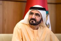 عکس؛ سفر به تاریخ؛ «شیخ محمد بن راشد» حاکم دُبی در 6 سالگی در آغوش پدرش