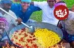 ببینید| غذای روستایی در هند؛ پخت یک غذای سنتی با برنج سرخ شده، مرغ و تخم مرغ