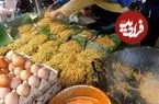 ببینید| غذای خیابانی در اندونزی؛ نودل سرخ شده با نیمرو در جاکارتا