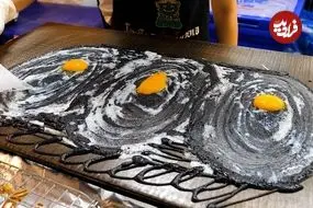 ببینید| غذای خیابانی در تایلند؛ تهیه پنکیک تخم مرغ و پنیر در بانکوک