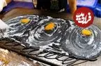 ببینید| غذای خیابانی در تایلند؛ تهیه پنکیک تخم مرغ و پنیر در بانکوک