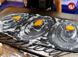 ببینید| غذای خیابانی در تایلند؛ تهیه پنکیک تخم مرغ و پنیر در بانکوک