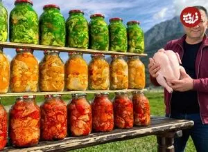 ببینید| غذای روستایی در آذربایجان؛ پخت مرغ در ظروف شیشه ای در کوهستان