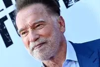 عکس| سفر در زمان؛ «آرنولد» در کنار همسرش و در جریان یک مبارزه بوکس؛ سال 1371