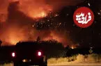 ببینید| فرار یک زوج با خودرو از آتش‌سوزی آخرالزمانی
