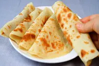 (ویدئو) از نانوایی نان نخرید؛ در 5 دقیقه این نان سنتی هندی را در خانه بپزید