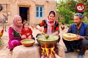 ببینید| غذای روستایی در افغانستان؛ پخت آش سنتی و نان در باغی سرسبز
