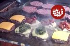 ببینید| غذای خیابانی در انگلستان؛ پخت همبرگر با پنیر سوئیسی در لندن