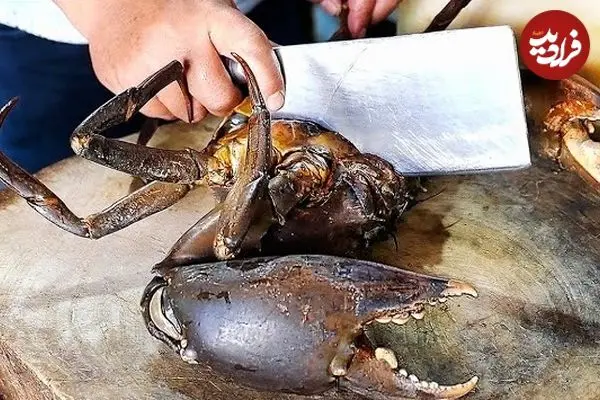 ببینید| غذای خیابانی در ویتنام؛ پخت غذا با خرچنگ گِلی در بانکوک