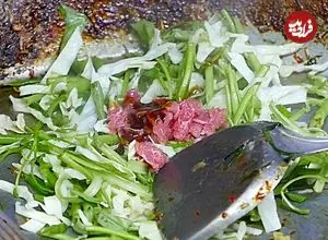 ببینید| غذای خیابانی در کامبوج؛ تهیه نودل سرخ شده با تخم مرغ و سبزیجات در سیم ریپ