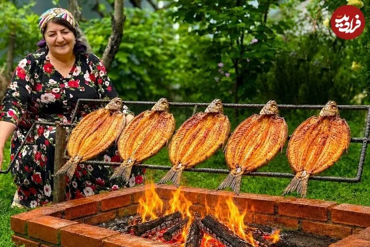 ببینید| غذای روستایی در آذربایجان؛ کباب کردن ماهی قزل آلا روی آتش