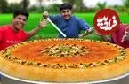 ببینید| غذای روستایی در هند؛ مراحل دیدنی پخت کنافه غول پیکر در طبیعت