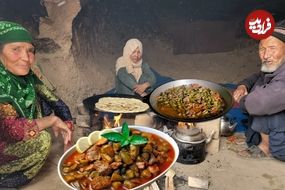 ببینید| غذای روستایی در افغانستان؛ پخت خوراک جگر و بامیه در غار توسط زوج مسن افغان