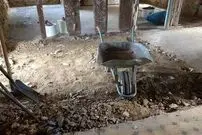 (تصاویر) بازسازی آشپزخانه به کشف گنجینۀ سکه‌های 400 ساله منجر شد!