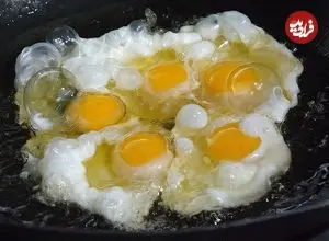 ببینید| غذای خیابانی در کره؛ تخم مرغ با برنج سرخ شده در سئول