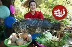 ببینید| غذای روستایی در کامبوج؛ بخارپز کردن یک ماهی بزرگ با سبزیجات و سس سویا