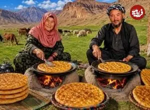 ببینید| غذای روستایی در افغانستان؛ پخت نان روغنی روی آتش توسط زوج مسن افغان