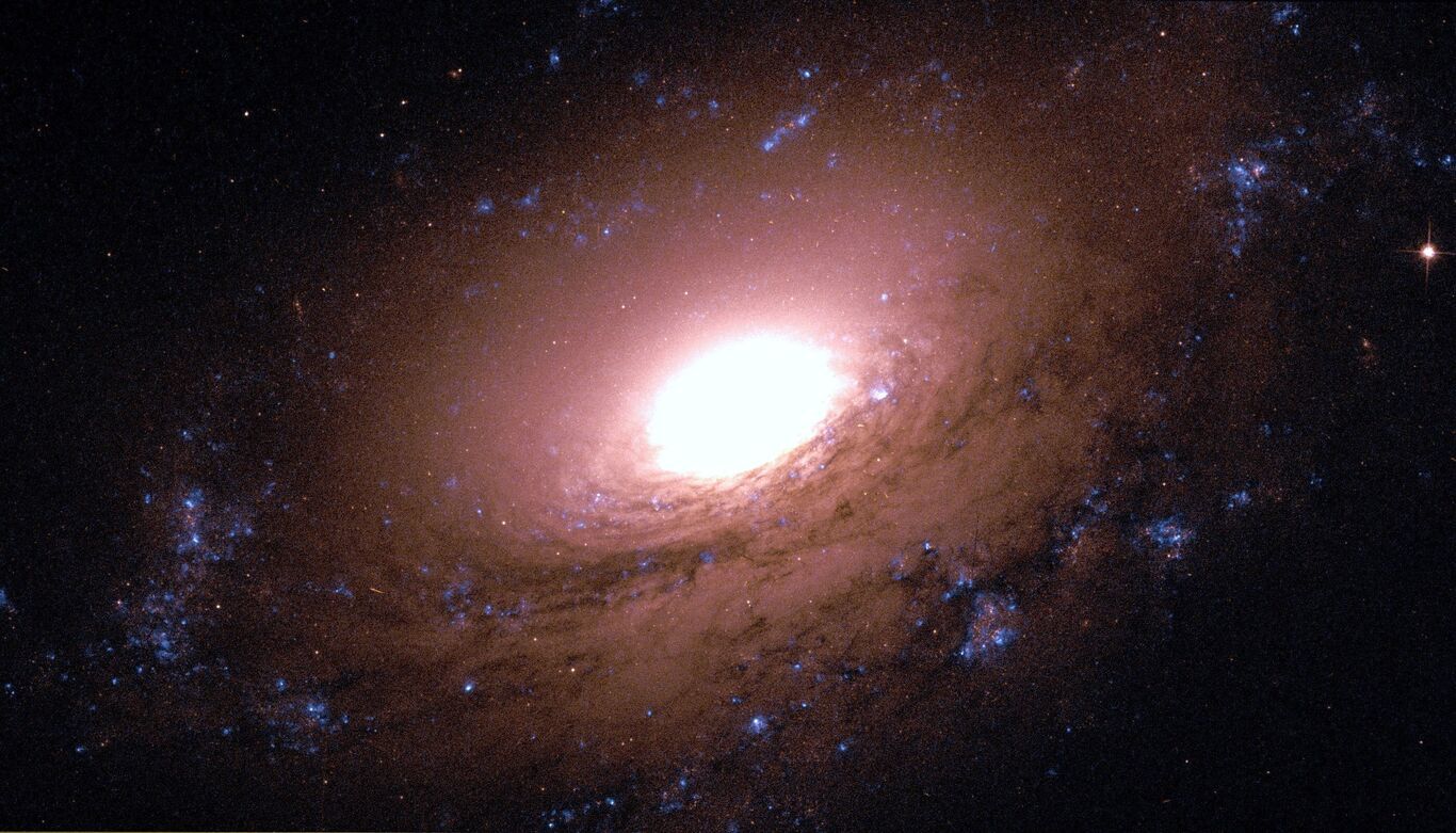 (عکس) کهکشان مارپیچی NGC ۳۱۶۹ فروپاشید