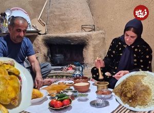 ببینید| غذای روستایی در ایران؛ پخت مرغ شکم پر توسط زوج روستایی