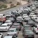عکس| سفر زمان؛ اتومبیل و الاغ‌ها در جاده برفی تهران_قزوین