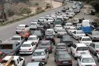 عکس| سفر زمان؛ اتومبیل و الاغ‌ها در جاده برفی تهران_قزوین