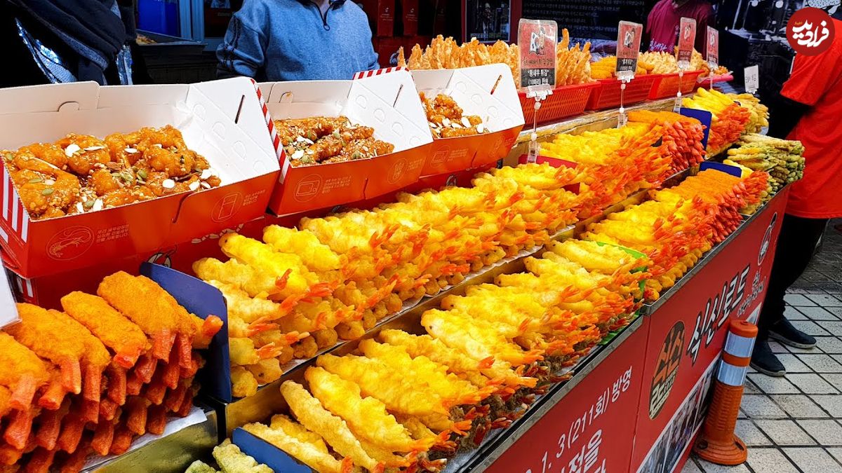 ببینید؛ غذای خیابانی در کره؛ میگو سوخاری، خرچنگ سرخ شده و مرغ کبابی در سئول