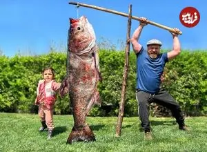 ببینید| غذای روستایی در آذربایجان؛ کباب ماهی غول پیکر ب همراه مرکبات در تنور 